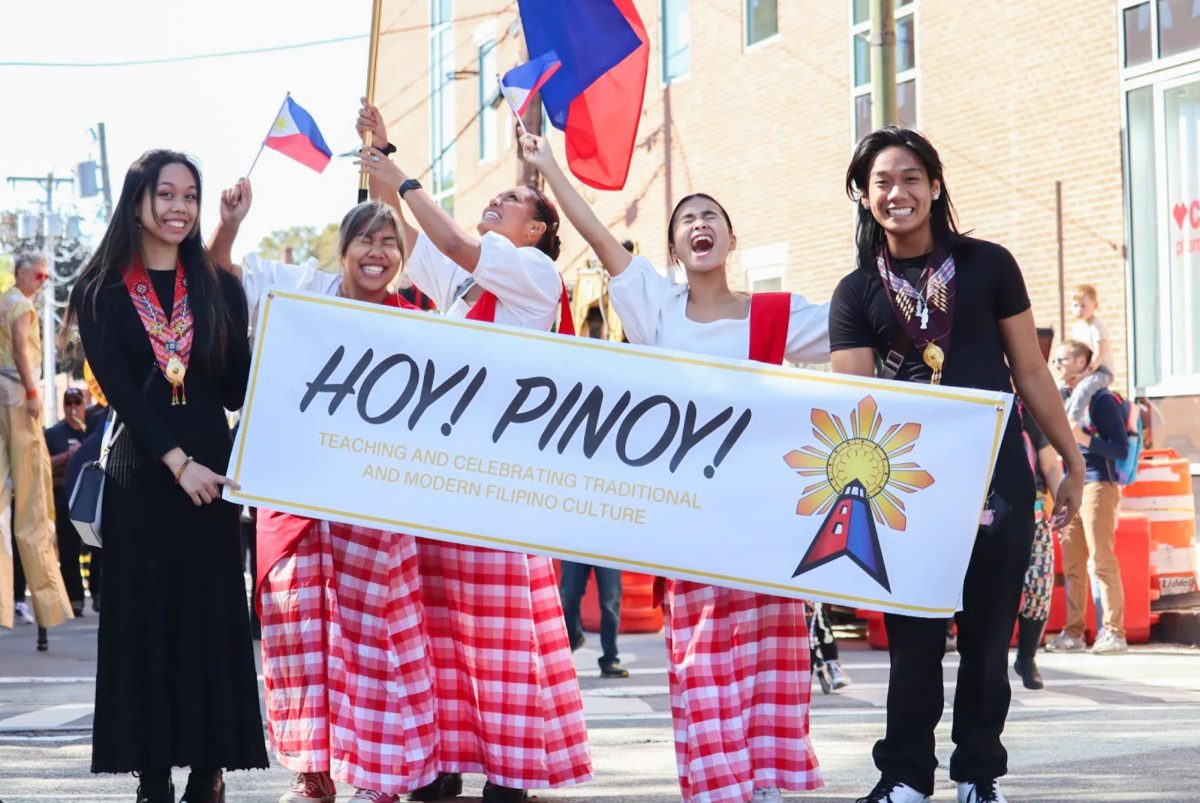 Members of Hoy! Pinoy! show club pride. Photo sent in by Hoy! Pinoy!