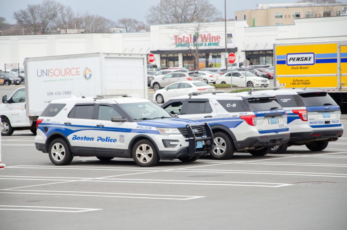 Boston Police cars parked at South Bay Shopping Center nearby campus. Photo by Saichand Chowdary / Mass Media Staff.
