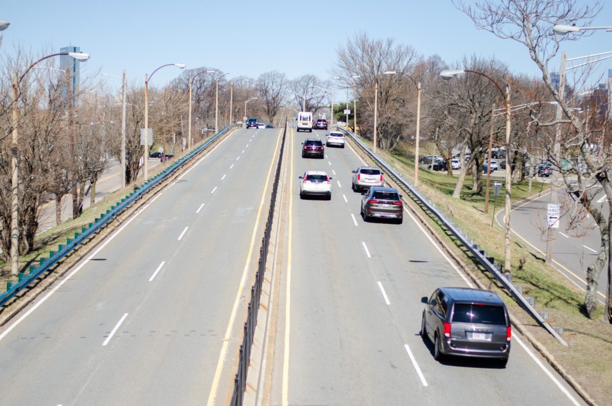 Cars drive down Morrissey Boulevard, a vital roadway for UMass Boston commuters. Photo by Saichand Chowdary / Mass Media Staff.