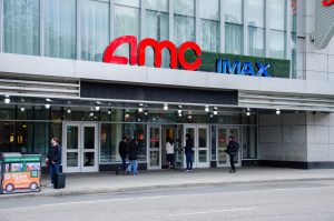 Moviegoers enter for a daytime showing at the AMC at Boston Common. Photo by Saichand Chowdary / Mass Media Staff