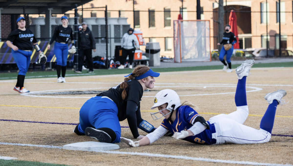 Infielder Hayley Krockta tags out the opponent during a recent game. Photo by Dong Wo Im / Mass Media Staff.