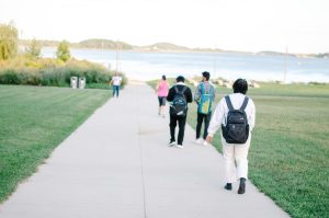 Students walking on the front lawn near Campus Center.