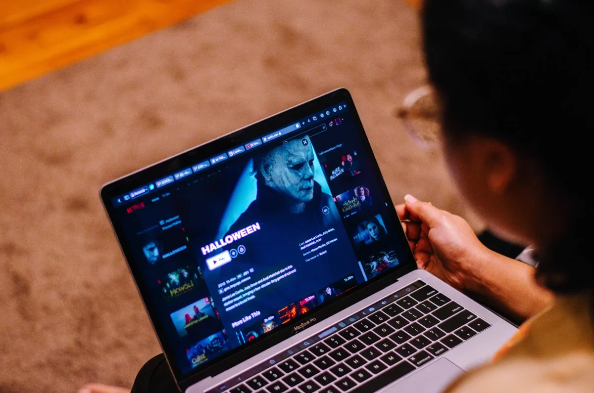 A student watches horror media on their laptop. Photo by Mass Media staff. 