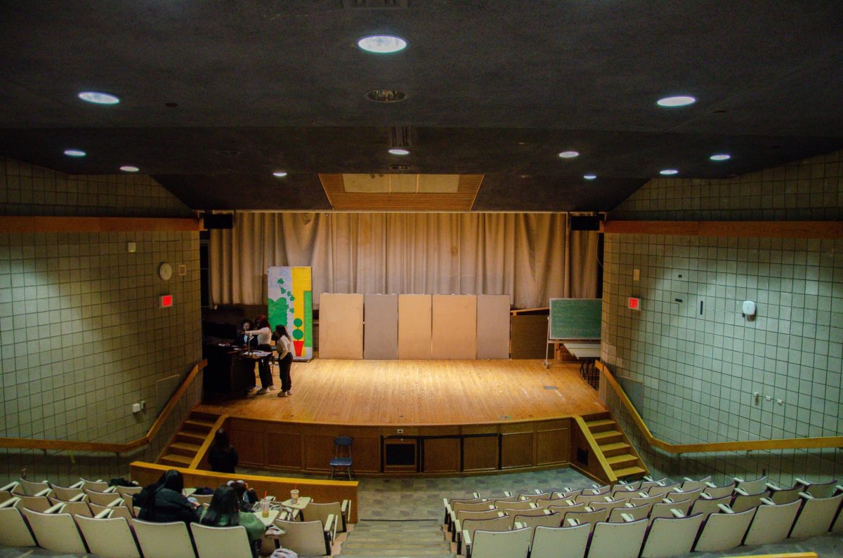 Students wait in Snowden Auditorium for the UMBeats club meeting to begin.