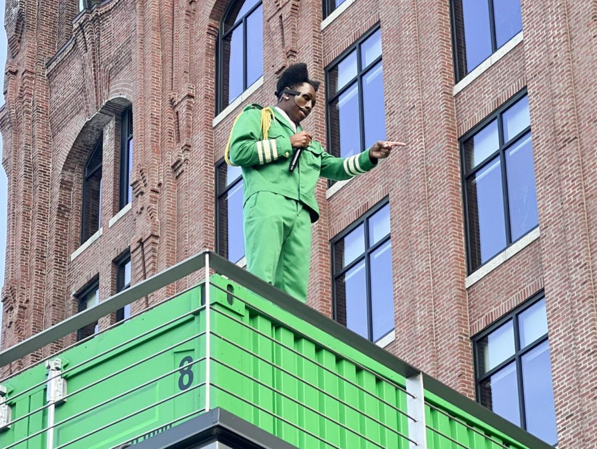 Tyler, the Creator stands on a trailer outside the Converse store to perform a $5 show celebrating the release of his eighth studio album.