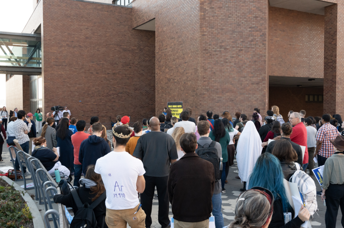 More than 100 union members and students, many dressed in Halloween costumes, gathered outside Phillis Wheatley Hall to demand a living wage and criticize the administration’s response to an Oct. 8 vigil mourning the death of Marcellus Williams, who was executed by the state of Missouri despite questions of his innocence, and victims of the war in Gaza.