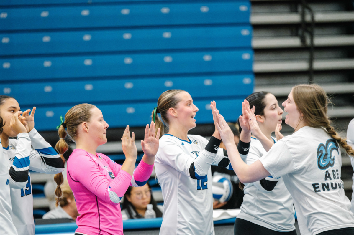 Women’s volleyball team celebrates after six straight wins.