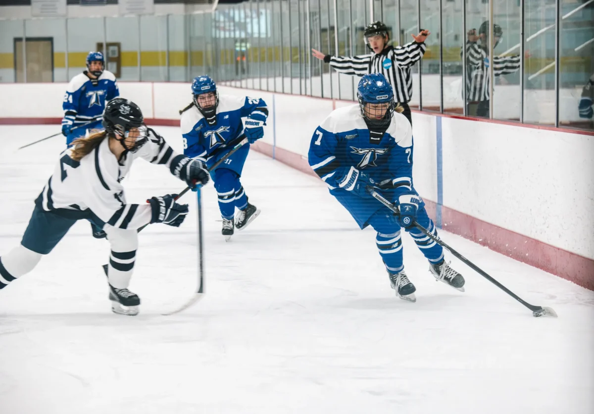 Cassidy Morrison skates up rink with the puck at a game this season. 