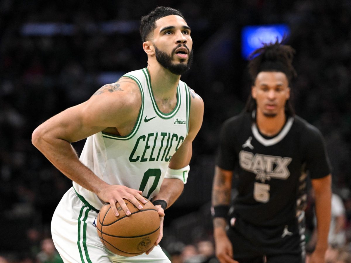 Feb 12, 2025; Boston, Massachusetts, USA; Boston Celtics forward Jayson Tatum (0) attempts a free throw against the San Antonio Spurs during the third quarter at the TD Garden. Credit: Brian Fluharty-Imagn Images