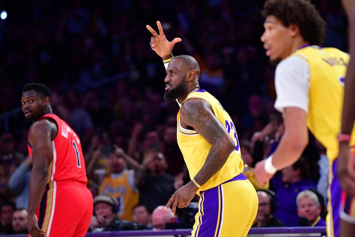 Mar 4, 2025; Los Angeles, California, USA;  Los Angeles Lakers forward LeBron James (23) reacts after scoring a three point basket and recording 50,000 career NBA points against the against the New Orleans Pelicans during the first half at Crypto.com Arena. Credit: Gary A. Vasquez-Imagn Images