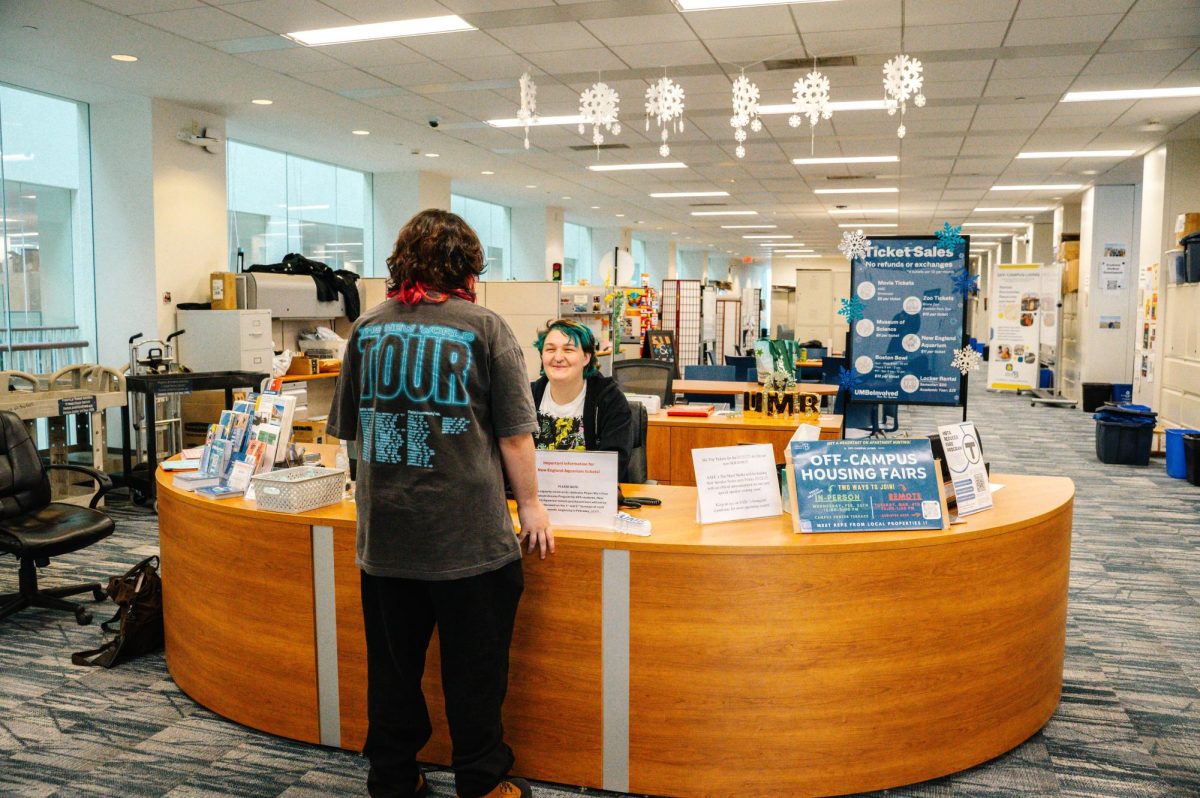 A student takes a break at the Student Activities Office in Campus Center.