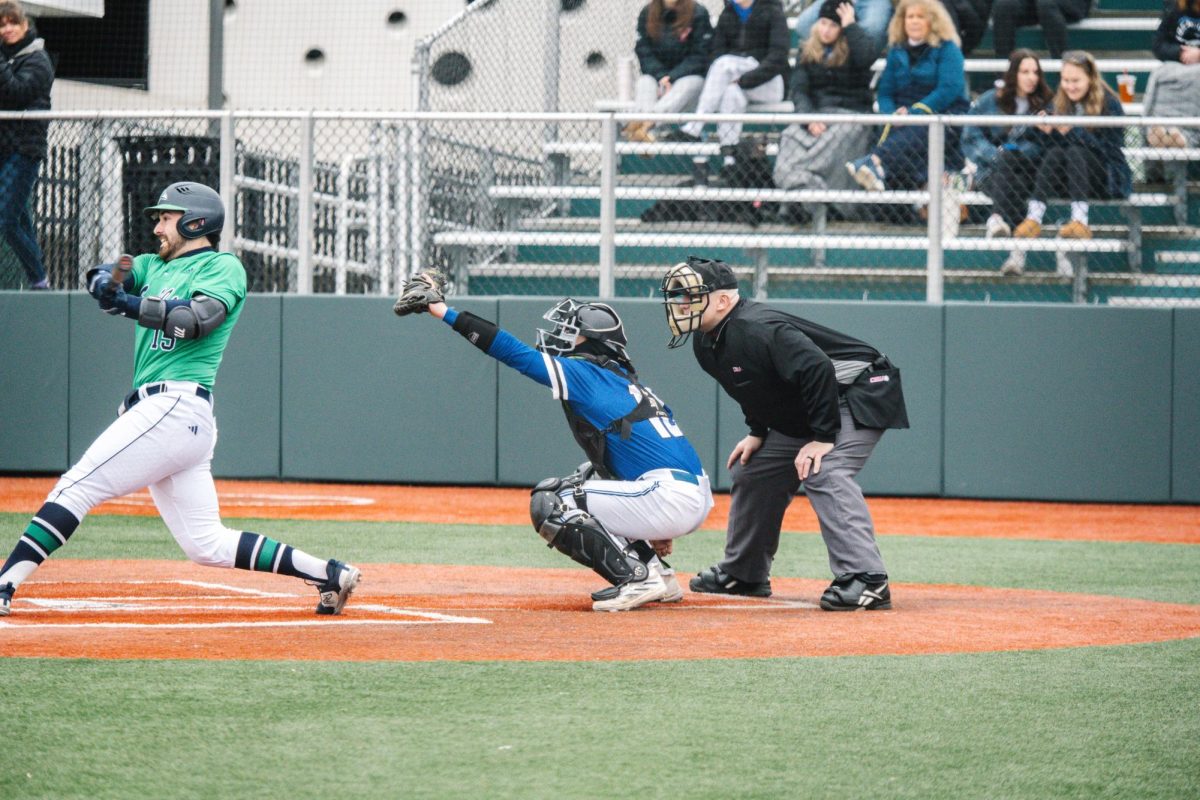 Men’s baseball catcher catches a strike last seaon. 