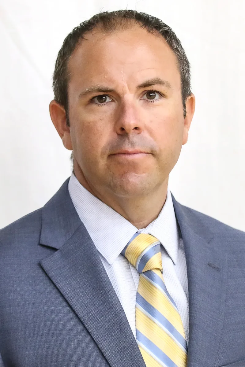 Head Men’s Ice Hockey Coach Peter
Belisle. Courtesy of Beacons Athletics