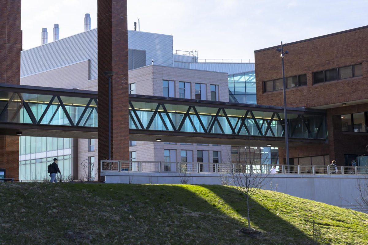 The catwalk connecting Healey Library and the Quinn Administration Building helps to protect students on windy days.
