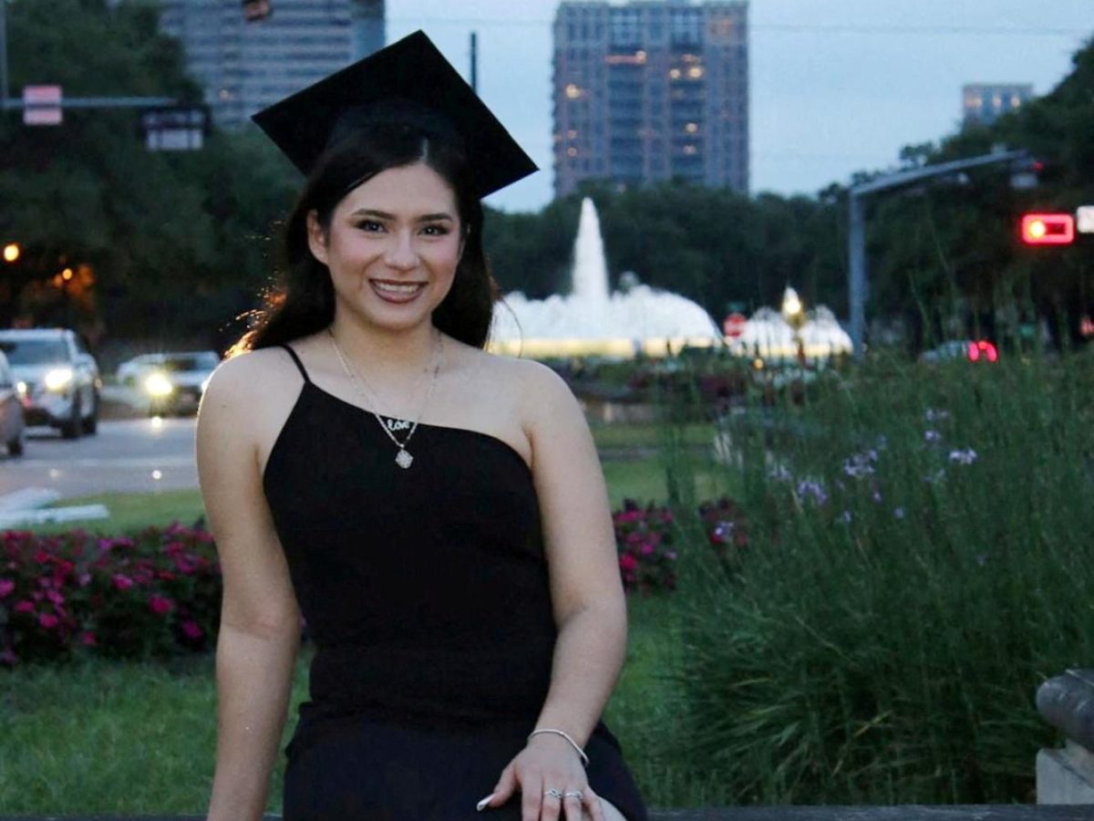 Babson College student Any Lucia Lopez Belloza poses wearing a mortarboard after graduating from high school in Boston, Massachusetts, U.S., in 2025. massdeportationdefense.org/Handout via REUTERS