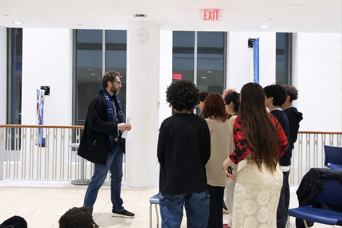 Assistant Vice Chancellor of Student Affairs Michael Metzger addresses student protesters in the Campus Center. Photo courtesy of Katerina Vatkin
