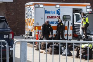 Boston Police and EMS unload training gear at Clark Athletic Center. Bridget Lord for The Mass Media