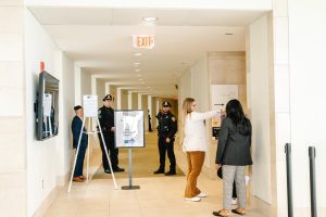 UMBPD guards the entrance to the ResilientMass climate summit March 27, 2025. The university wrote that there are no documents indicating that anyone was billed for the UMBPD’s services.