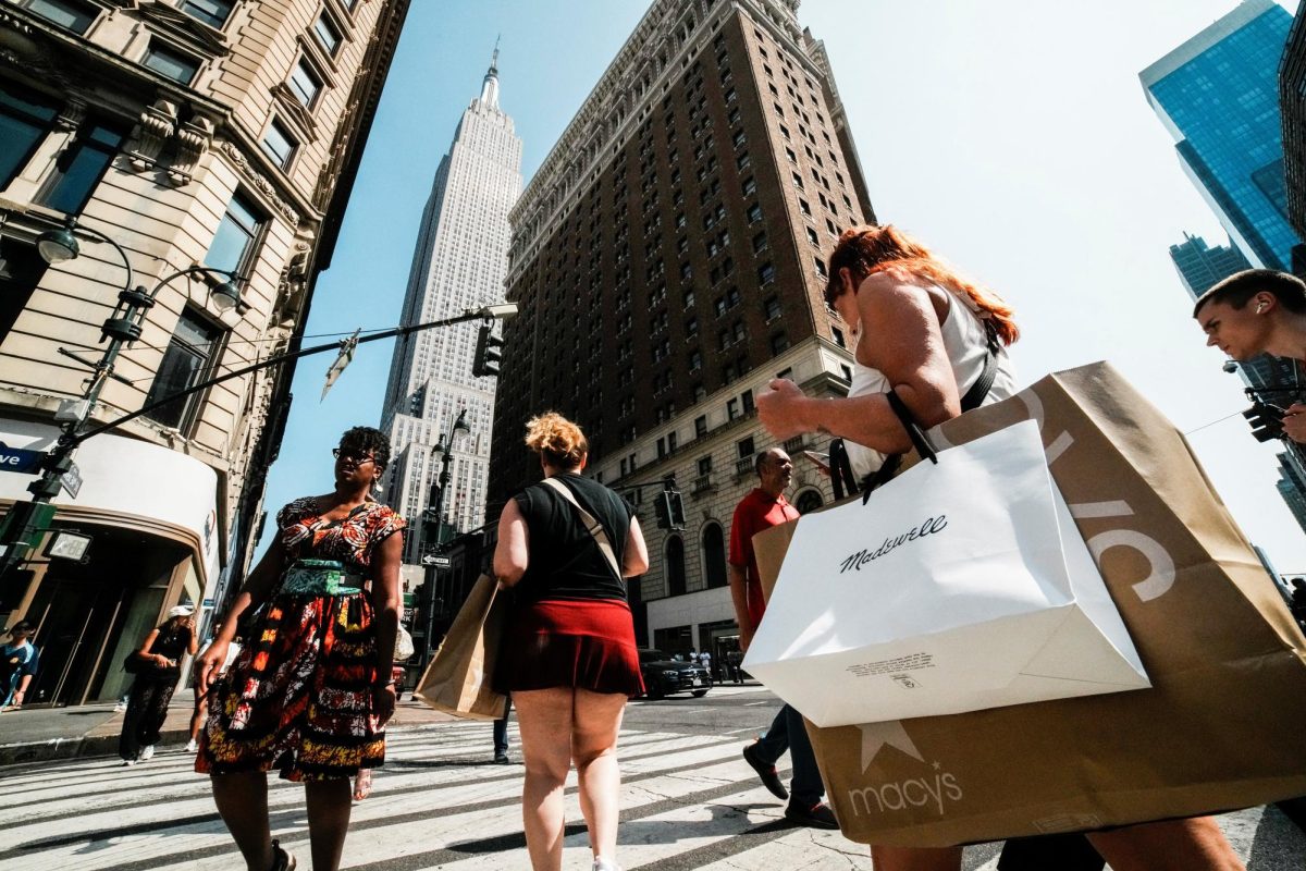 A woman carries shopping bags in Manhattan in New York City. REUTERS/Eduardo Muno