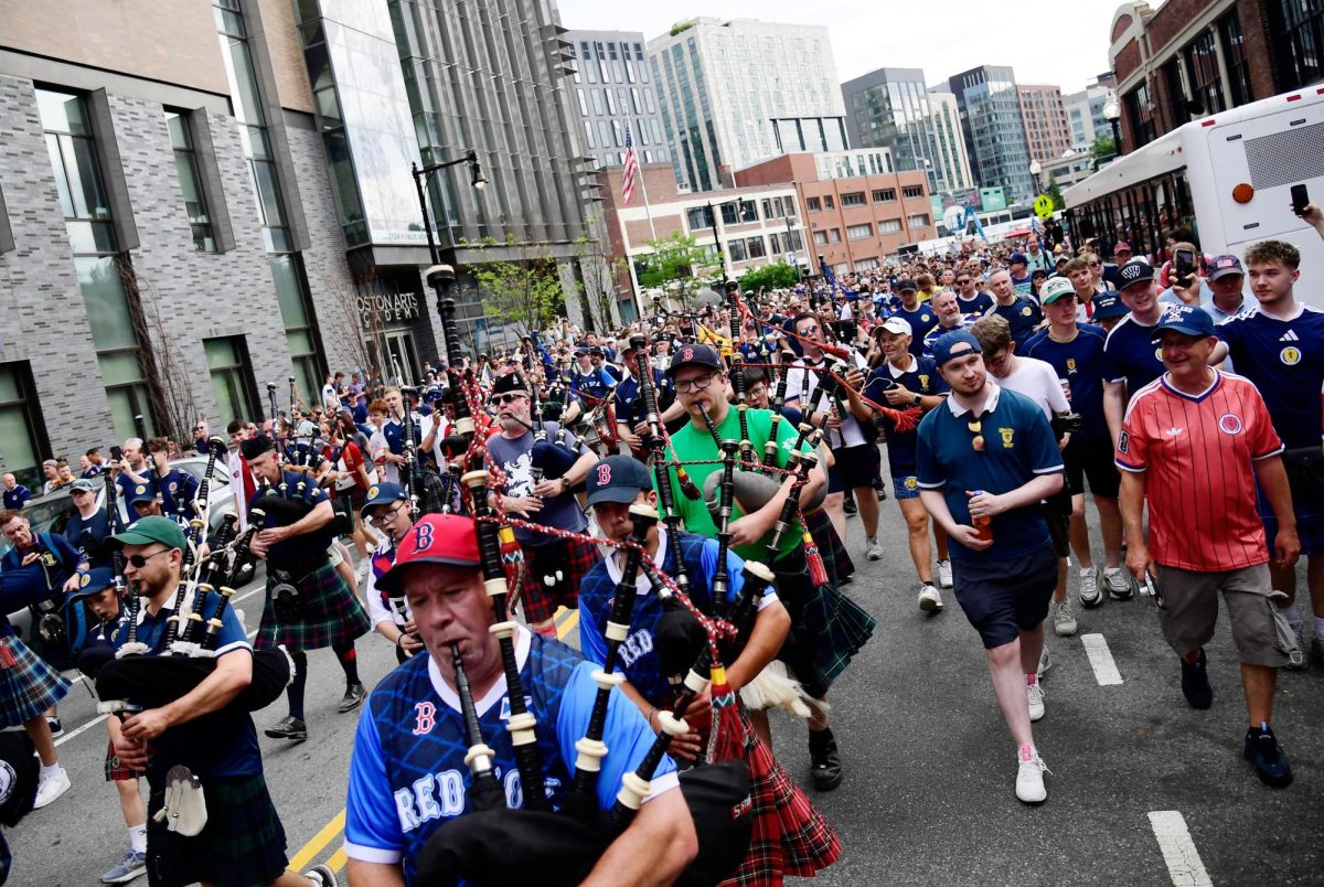 Soccer Football - FIFA World Cup 2026 - Scotland's Tartan Army march to Boston's Fenway Park baseball stadium - Boston, Massachusetts, U.S. - June 14, 2026 Scotland fans wearing kilts and playing the bagpipes during the march to Fenway Park IMAGN IMAGES via Reuters/Bob Dechiara
